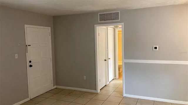 a view of an empty room with window