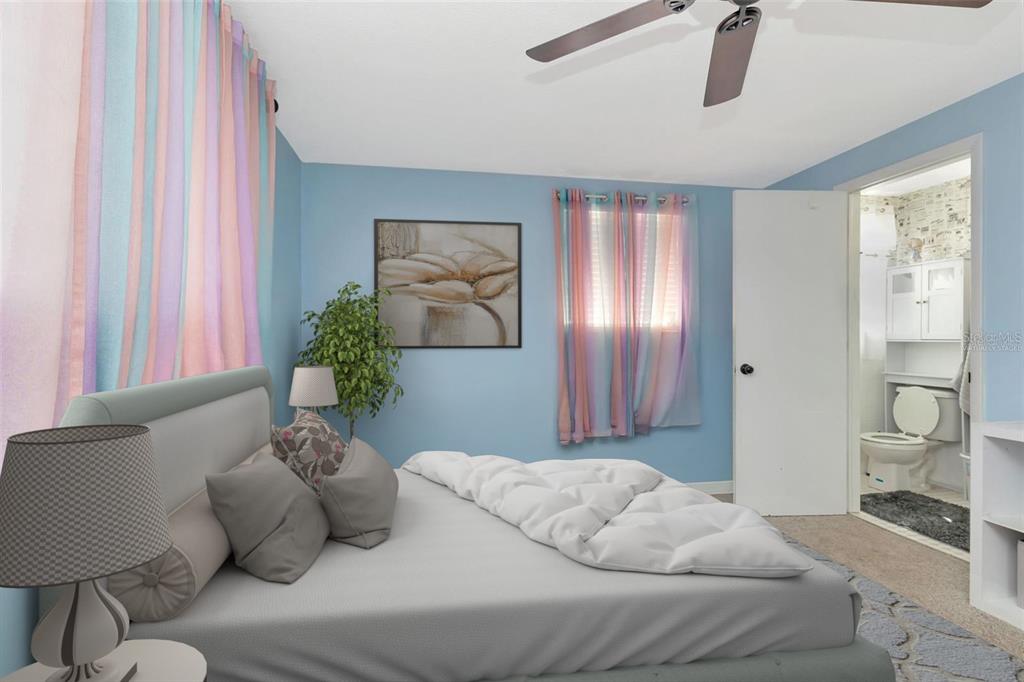 10301 Orchid Drive Port Richey, FL 34668 - Photo 15 of 35 a living room with furniture and a potted plant