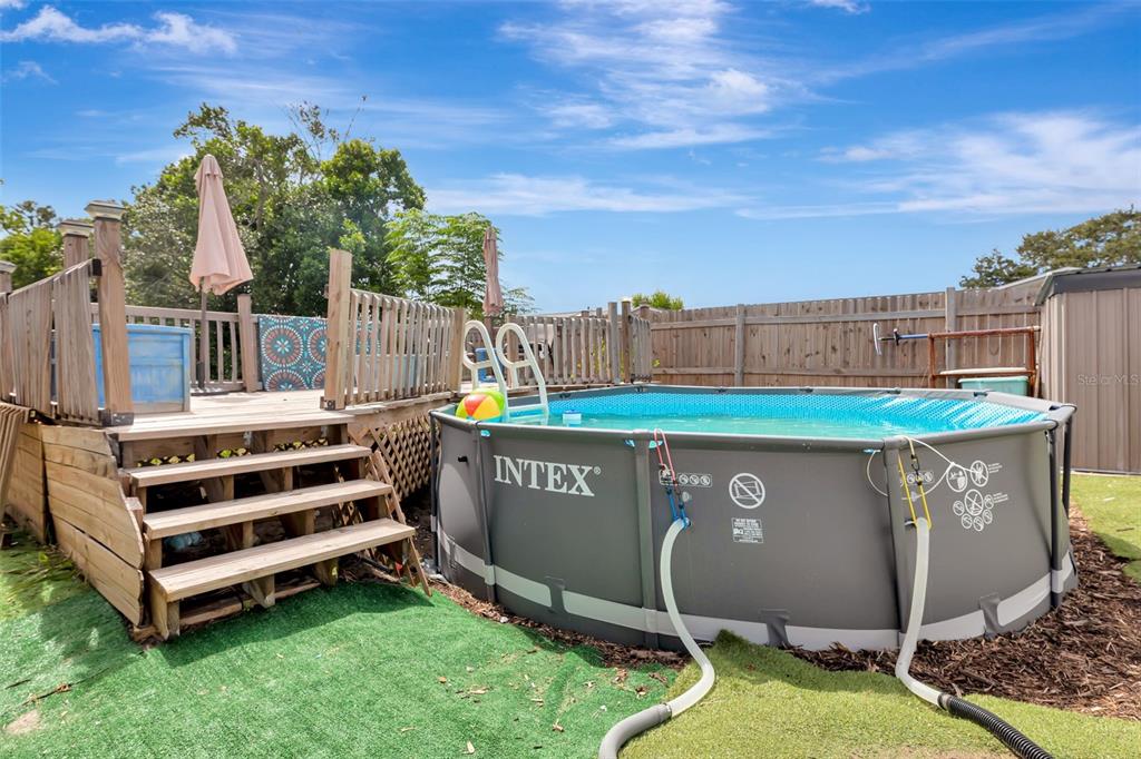 10301 Orchid Drive Port Richey, FL 34668 - Photo 32 of 35 a view of a backyard with a sitting area