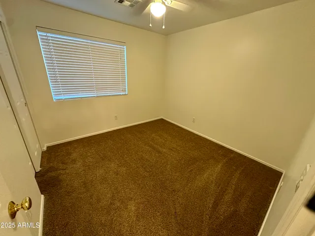 a view of a room with a window