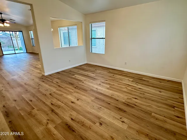 a view of an empty room and window
