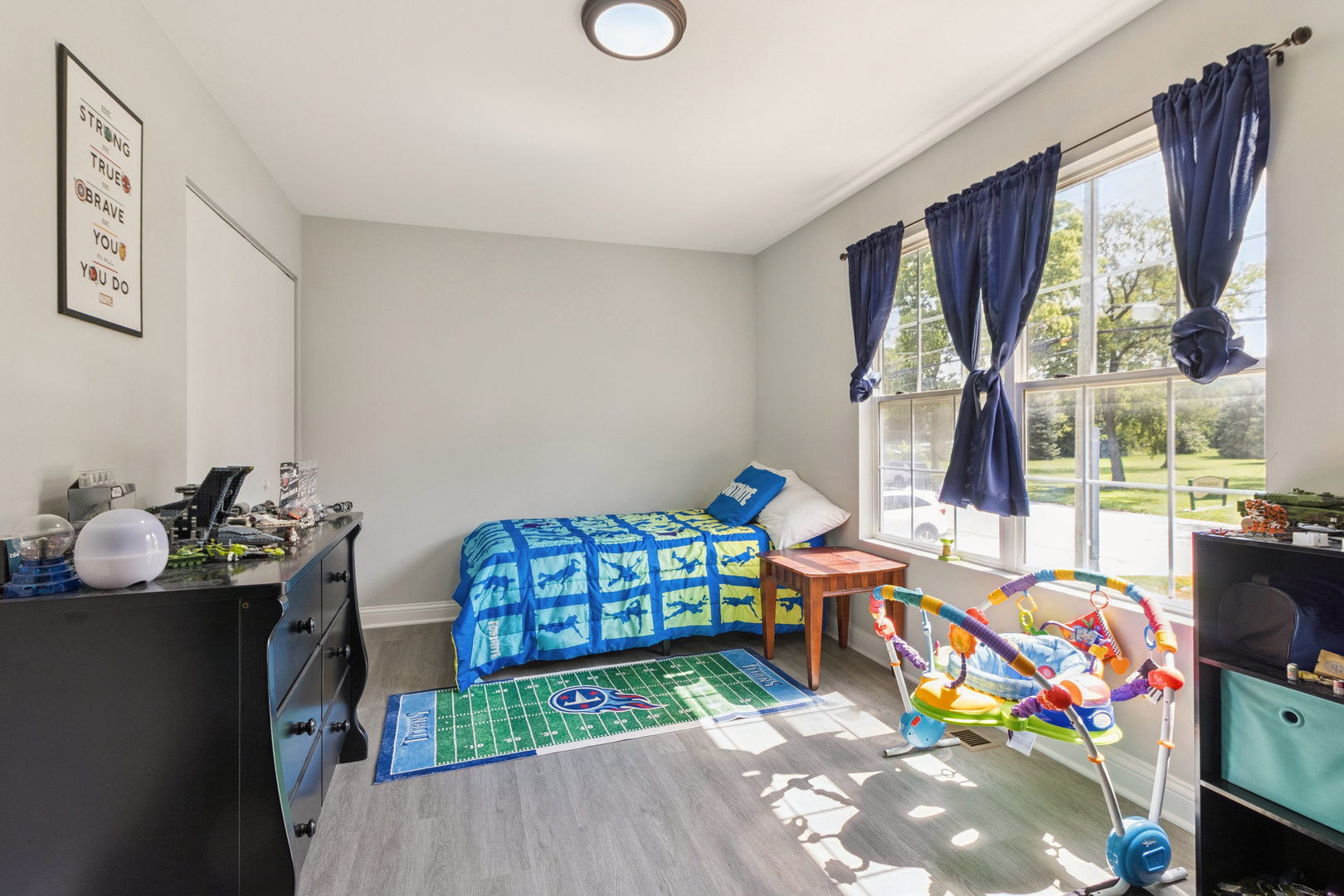 1243 Jericho Road Aurora, IL 60506 - Photo 11 of 25 a reading room with furniture toys and a large window