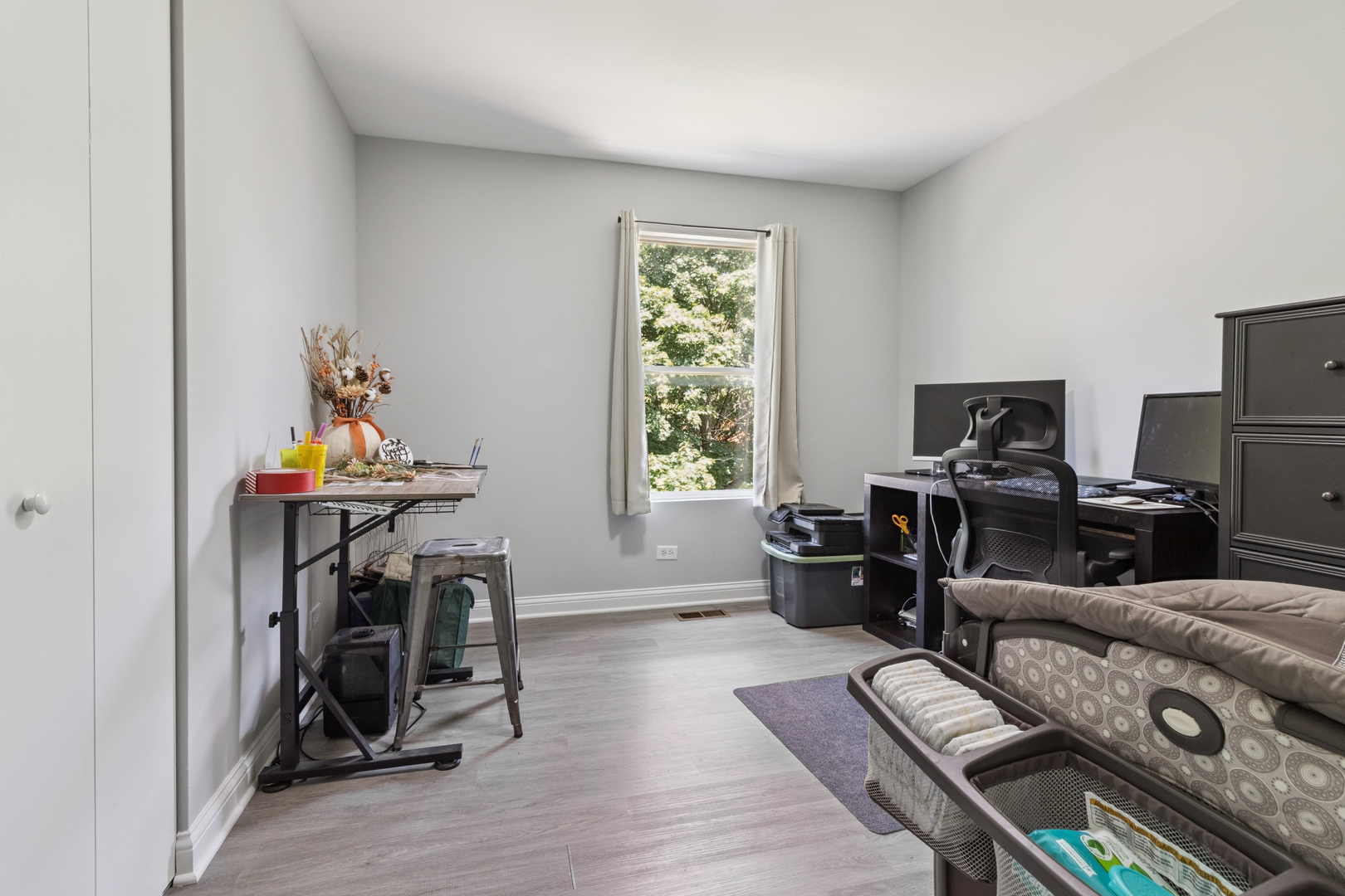 1243 Jericho Road Aurora, IL 60506 - Photo 12 of 25 a living room with furniture and wooden floor