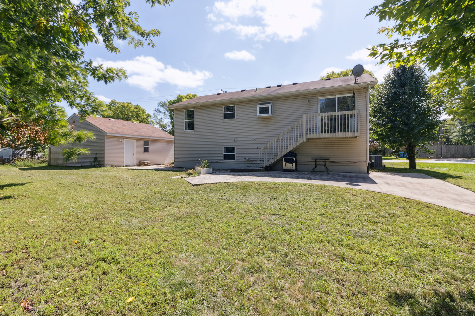 1243 Jericho Road Aurora, IL 60506 - Photo 22 of 25 a view of a house with a yard