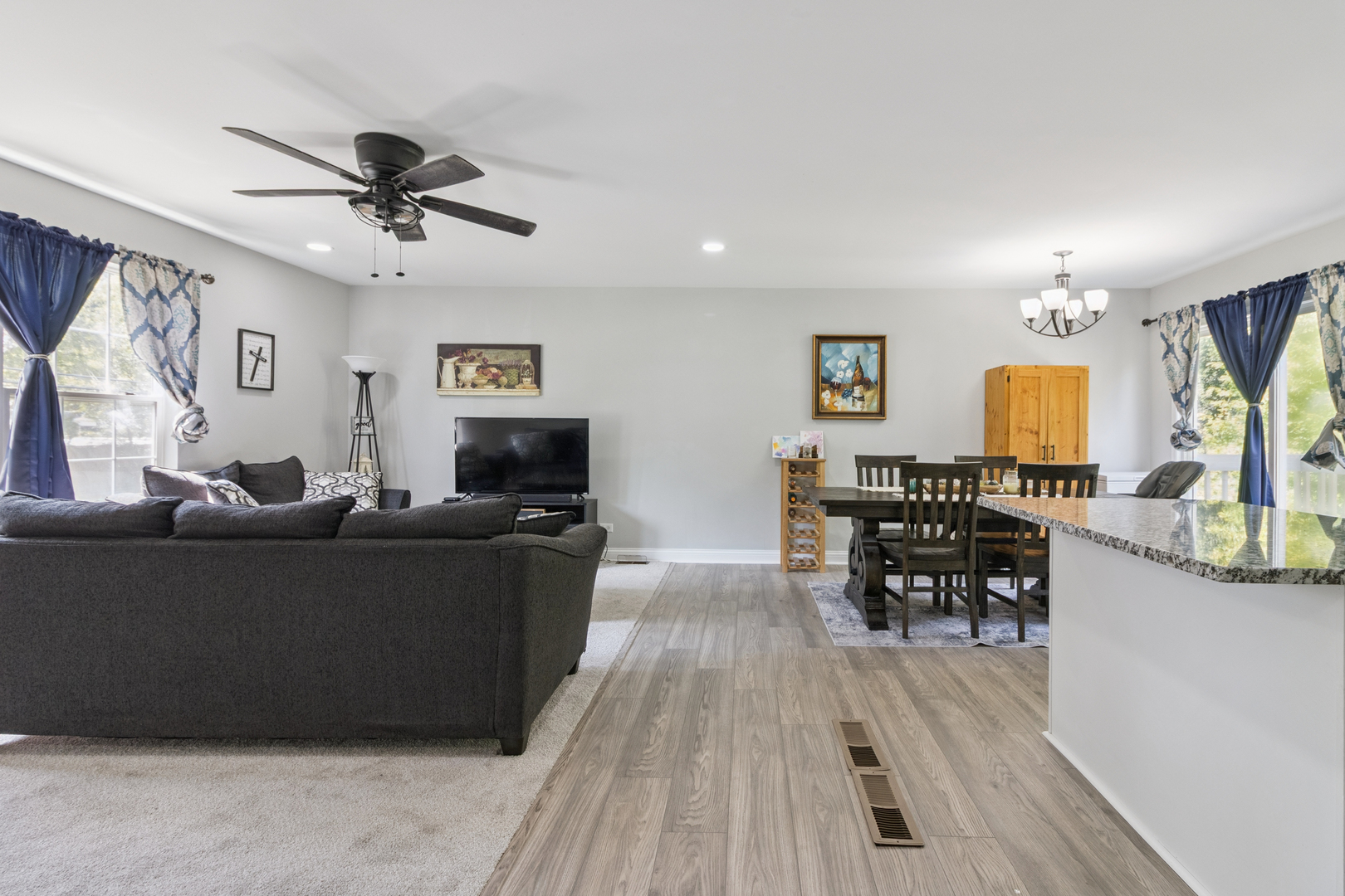 1243 Jericho Road Aurora, IL 60506 - Photo 3 of 25 a living room with furniture and a wooden floor