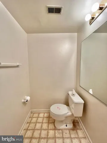 a bathroom with a toilet