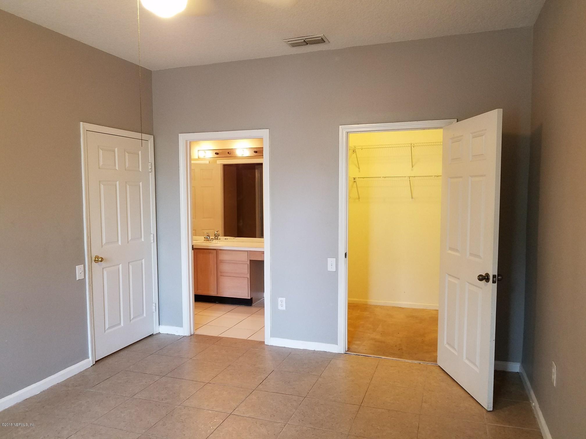 10550 Baymeadows Road, Unit 525 Jacksonville, FL 32256 - Photo 12 of 14 3rd bdrm- walk-in- closet and access to