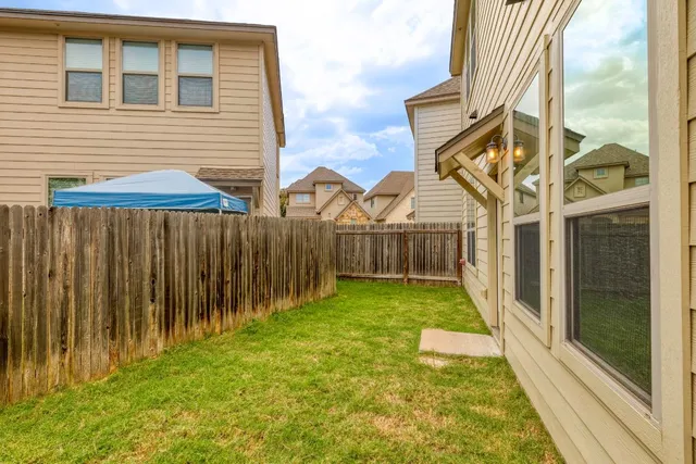 a view of a backyard with a garden