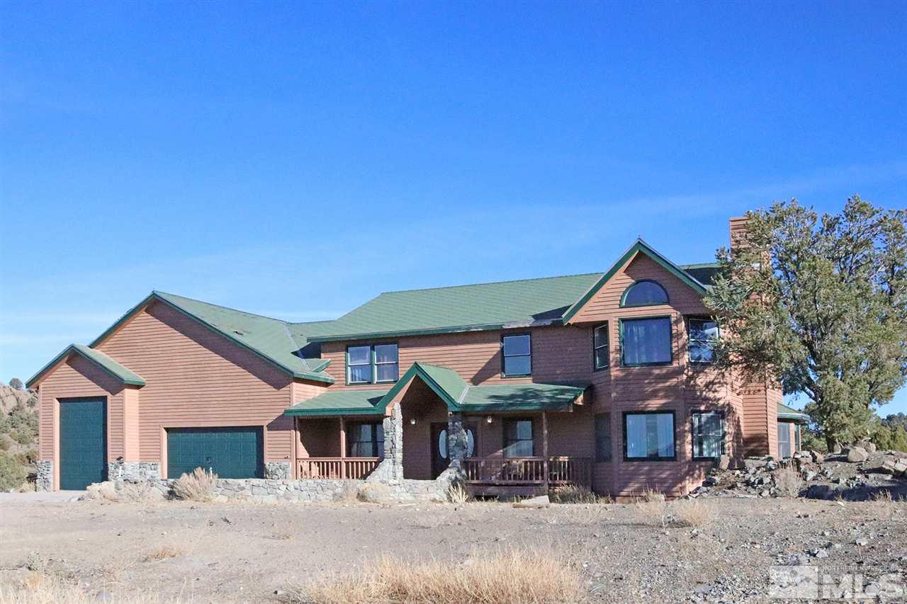 1685 Lousetown Road Reno, NV 89521 - Photo 1 of 28 front view of a house with a yard