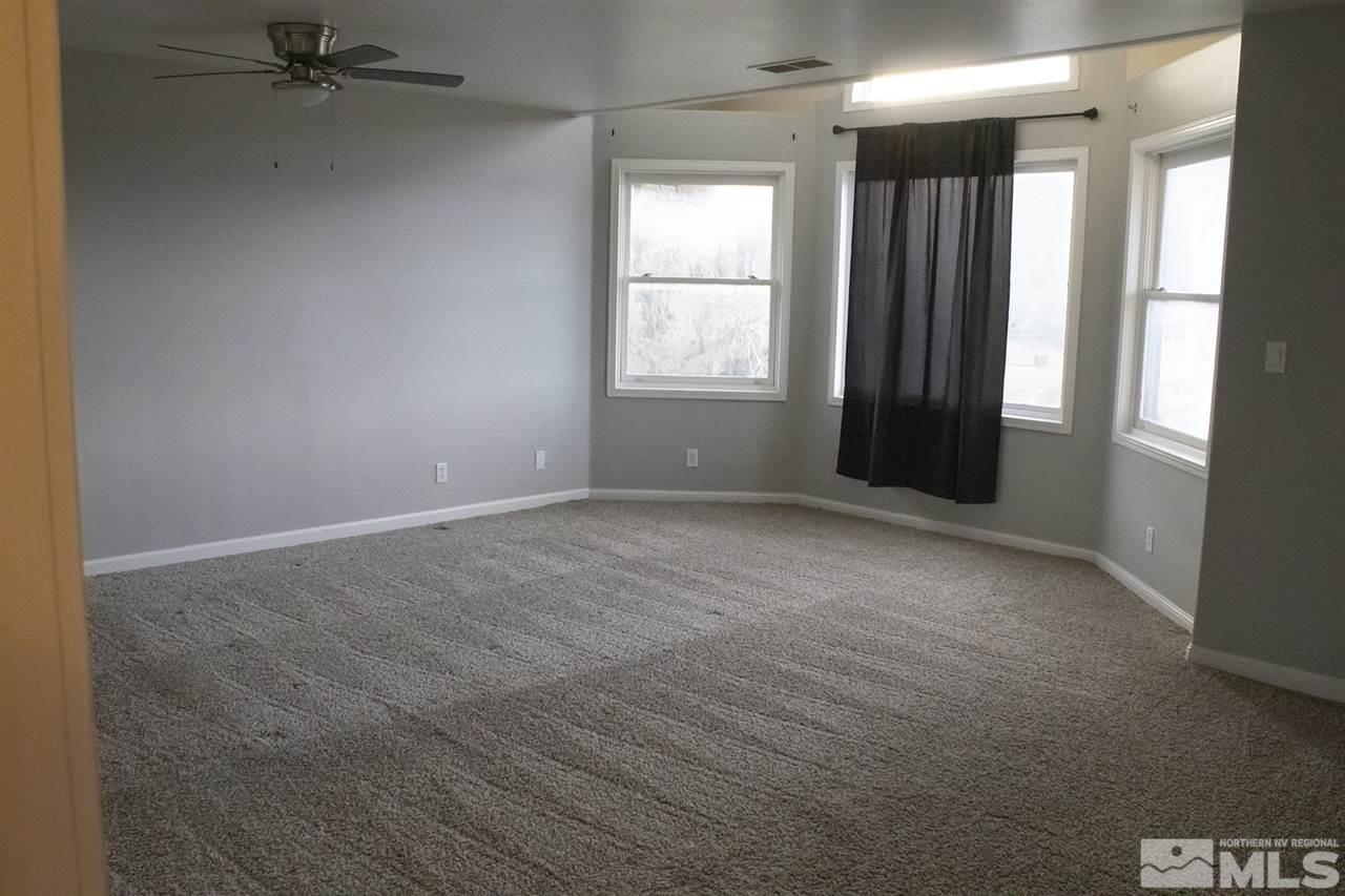 1685 Lousetown Road Reno, NV 89521 - Photo 13 of 28 a view of an empty room with a window