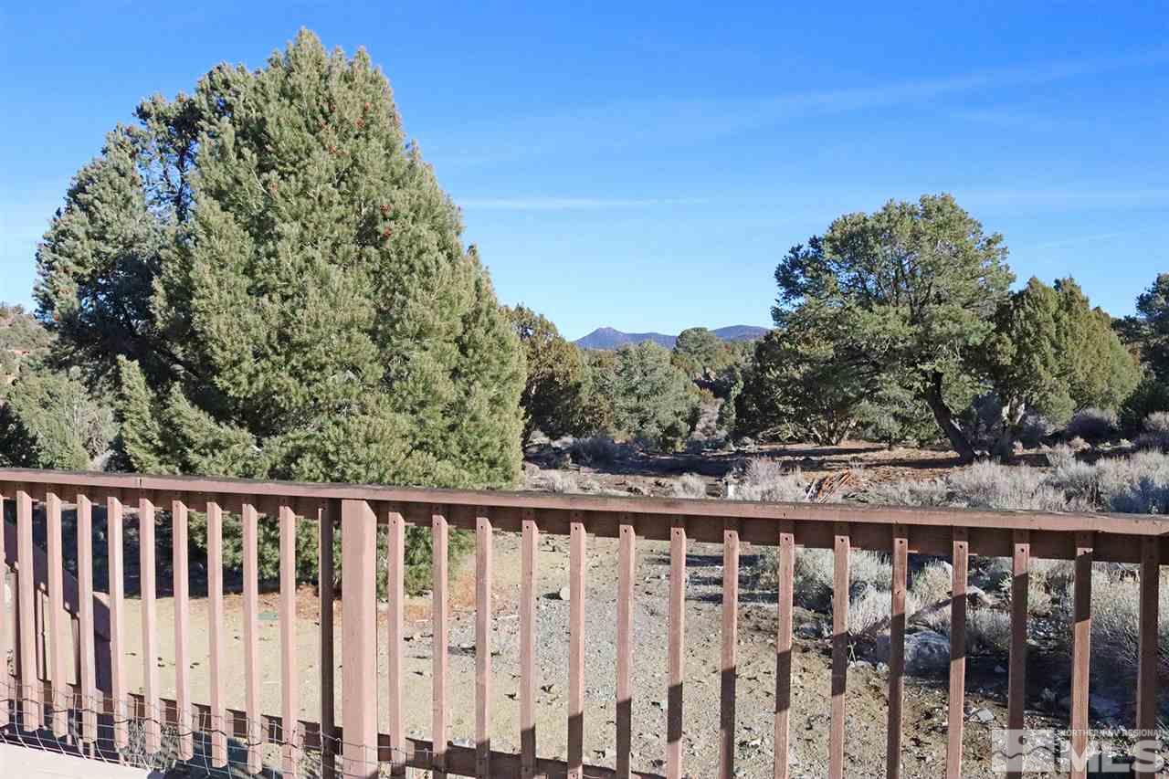 1685 Lousetown Road Reno, NV 89521 - Photo 5 of 28 a balcony with trees in front of it