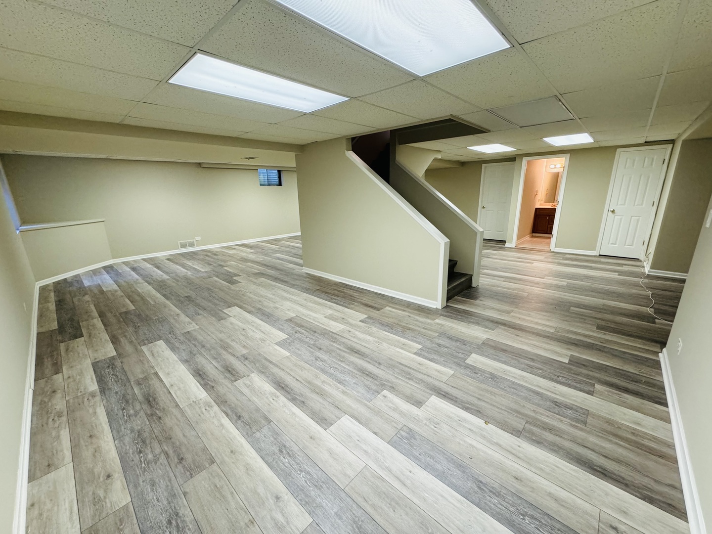 1398 East Gartner Road Naperville, IL 60540 - Photo 26 of 31 a view of a hallway with wooden floor