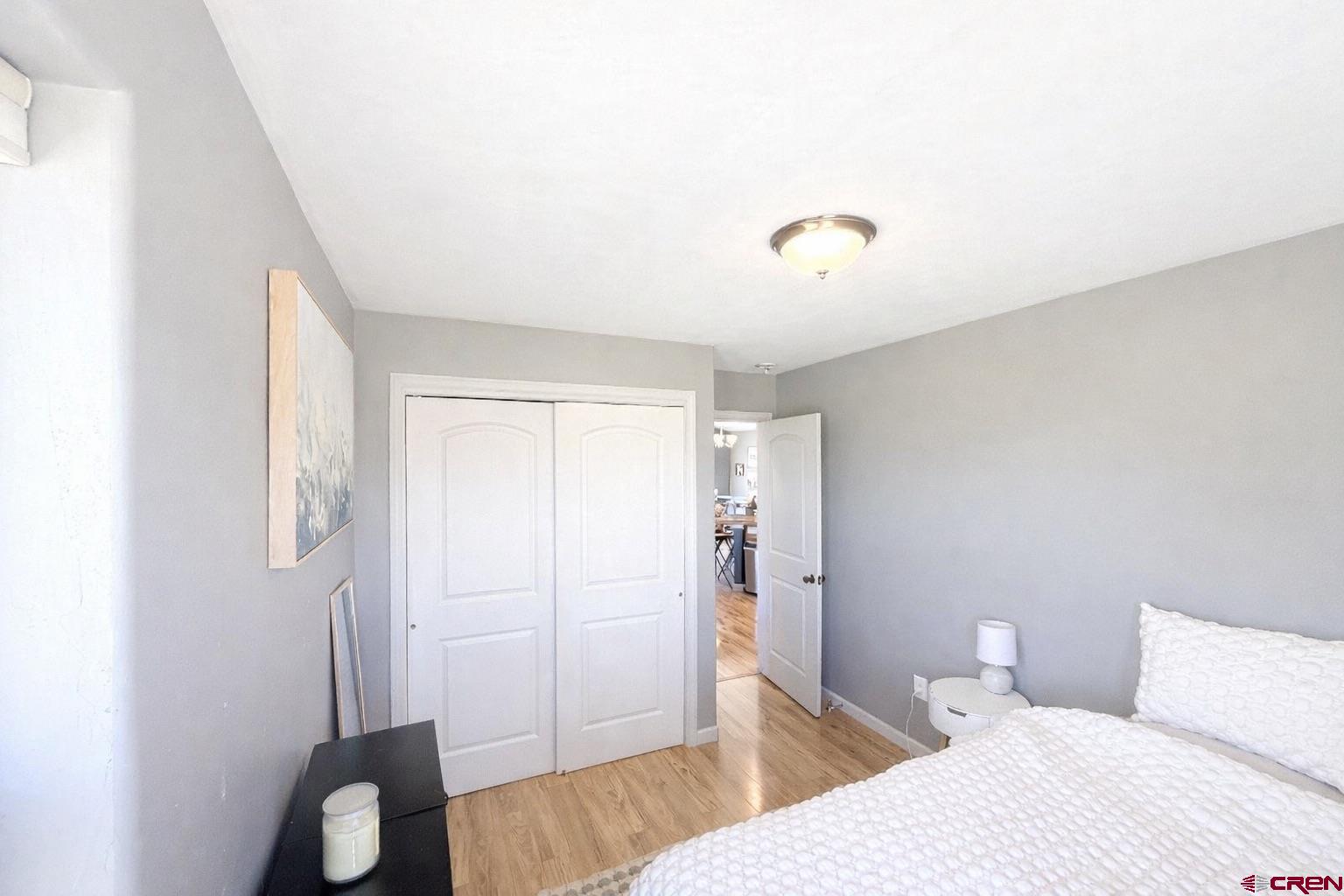 15807 5790th Road Montrose, CO 81403 - Photo 12 of 30 a bedroom with a bed and a rug