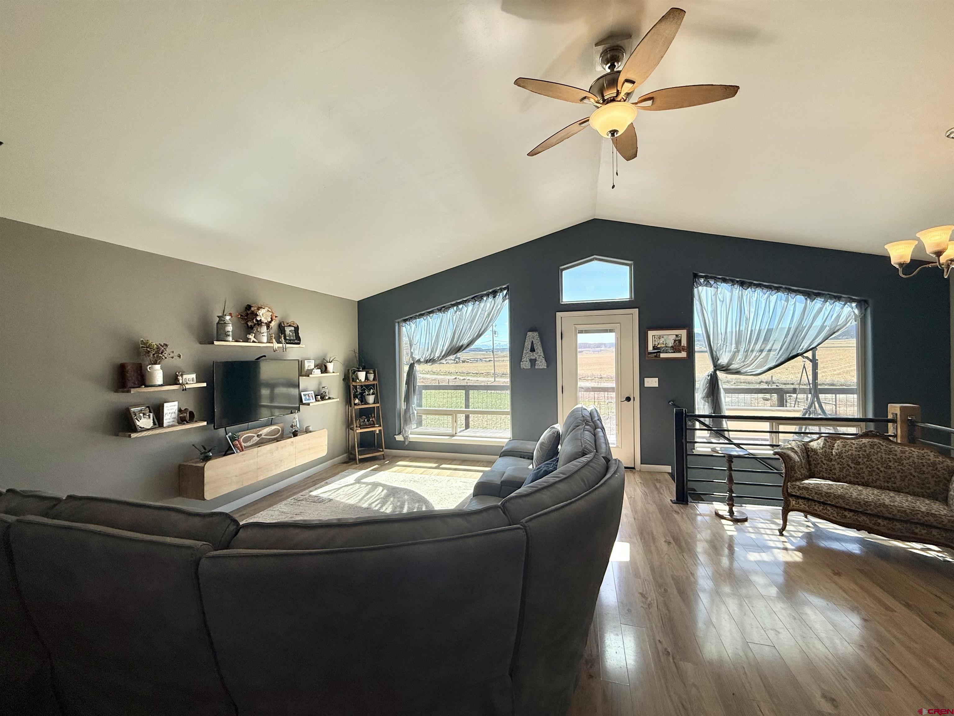 15807 5790th Road Montrose, CO 81403 - Photo 5 of 30 a living room with furniture and a large window