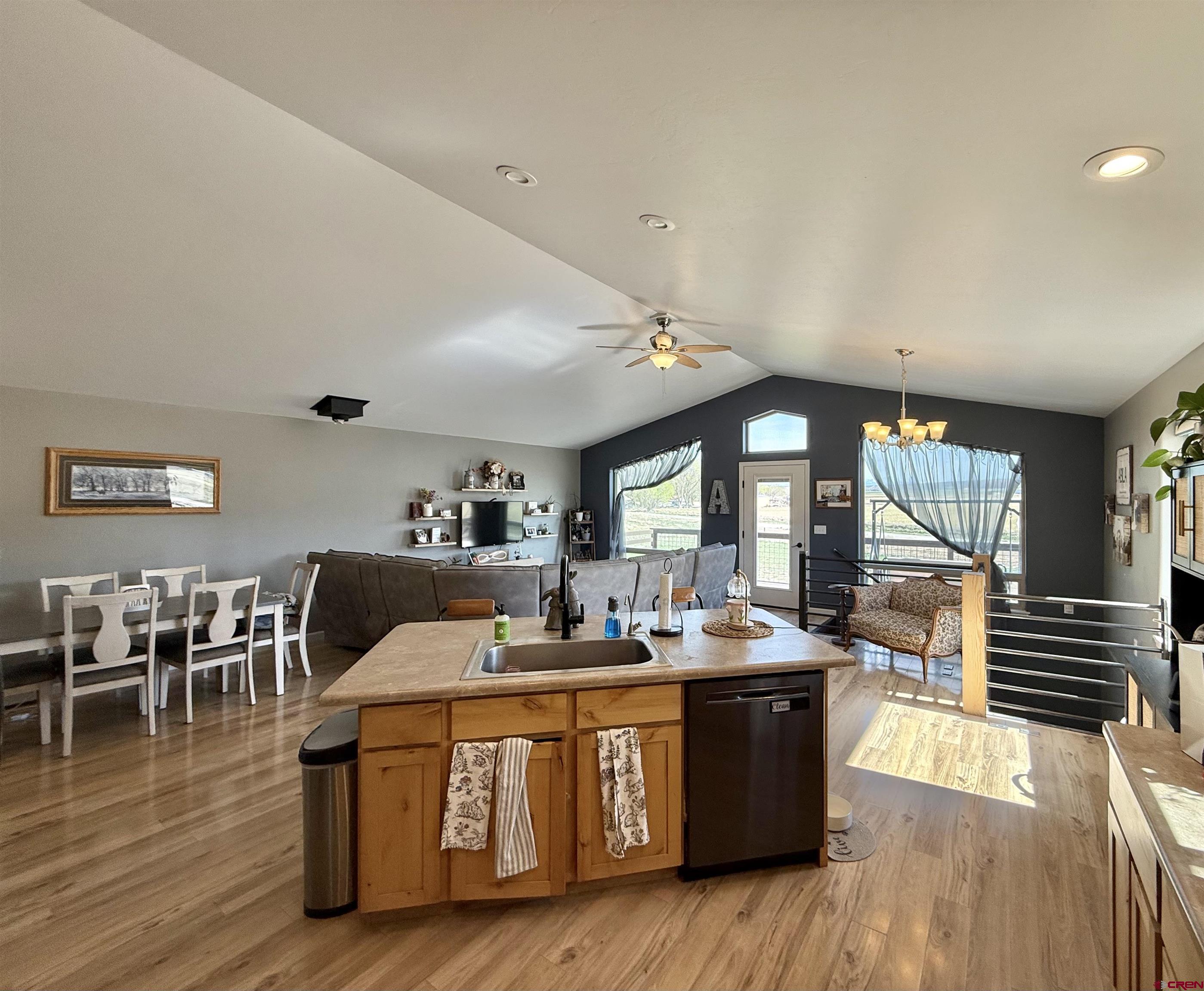 15807 5790th Road Montrose, CO 81403 - Photo 9 of 30 a living room with furniture and wooden floor