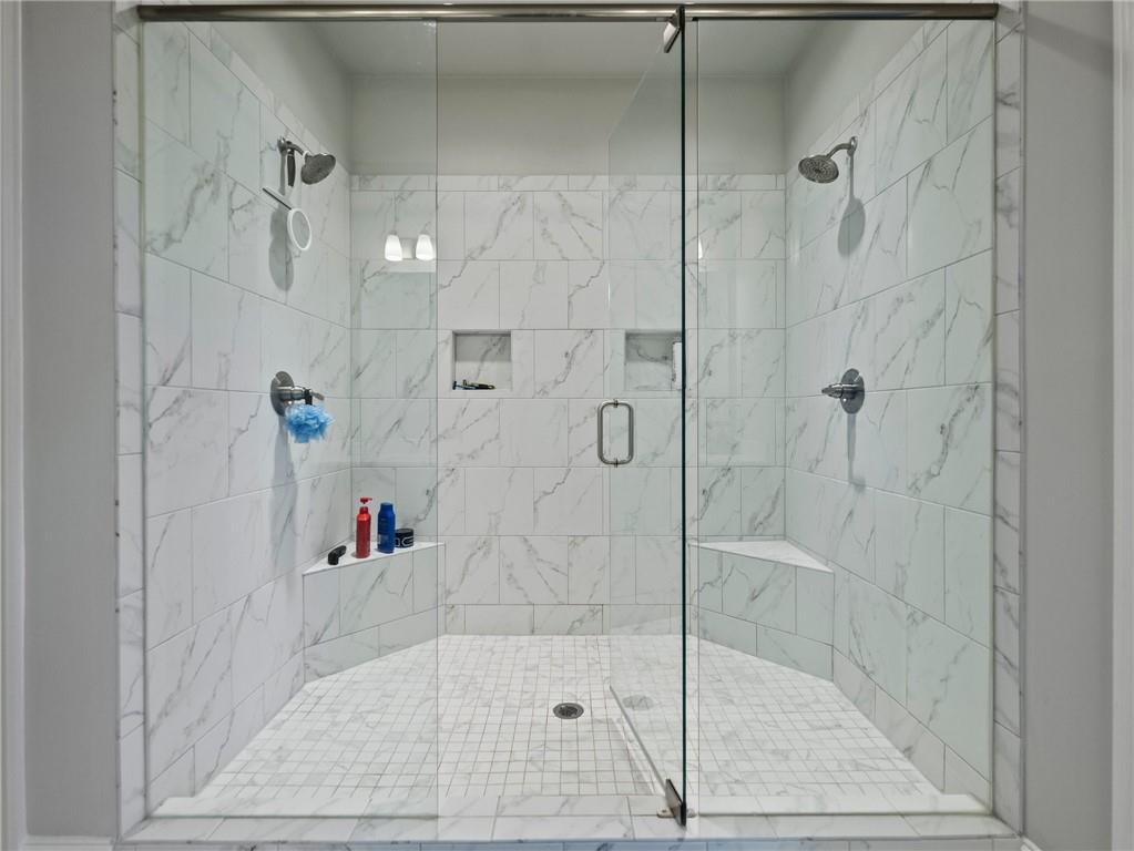 857 Champagne Lane Hoschton, GA 30548 - Photo 32 of 73 a bathroom with a shower