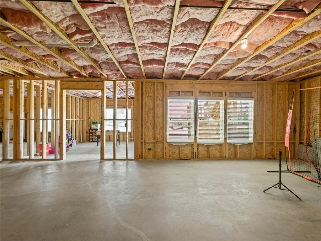 857 Champagne Lane Hoschton, GA 30548 - Photo 54 of 73 a view of an empty room with glass door