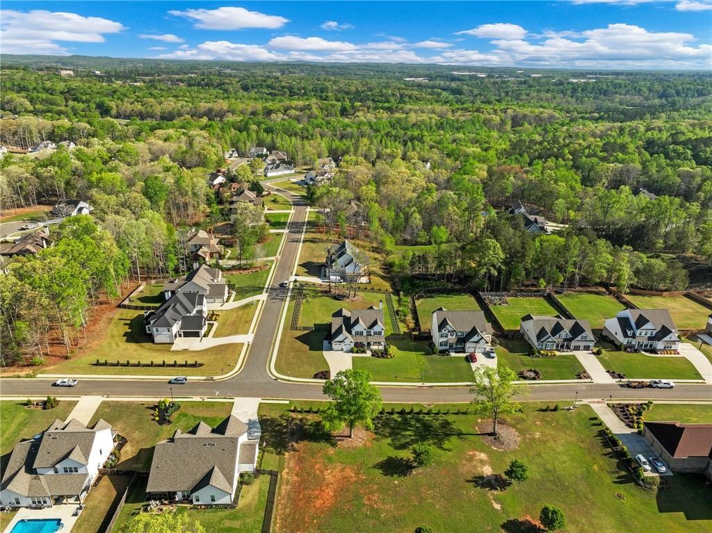 857 Champagne Lane Hoschton, GA 30548 - Photo 71 of 73 an aerial view of residential houses with outdoor space