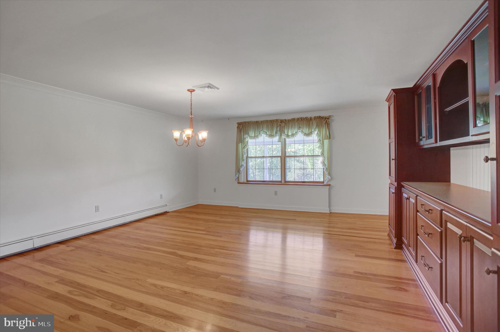98 Peach Glen Road Gardners, PA 17324 - Photo 4 of 85 wooden floor in an empty room with a window
