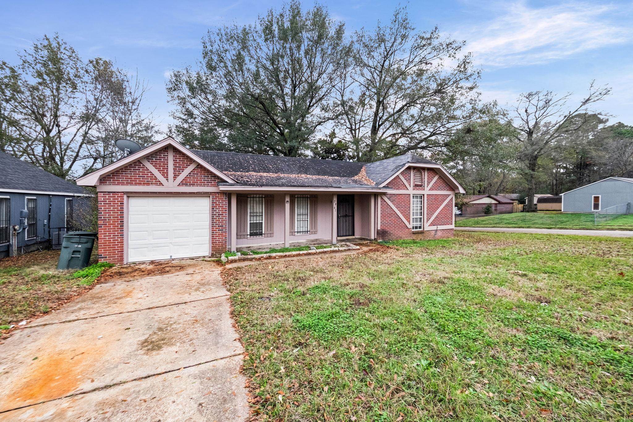 2967 Meadowfair Road Memphis, TN 38118 - Photo 2 of 19 a view of a house with a yard