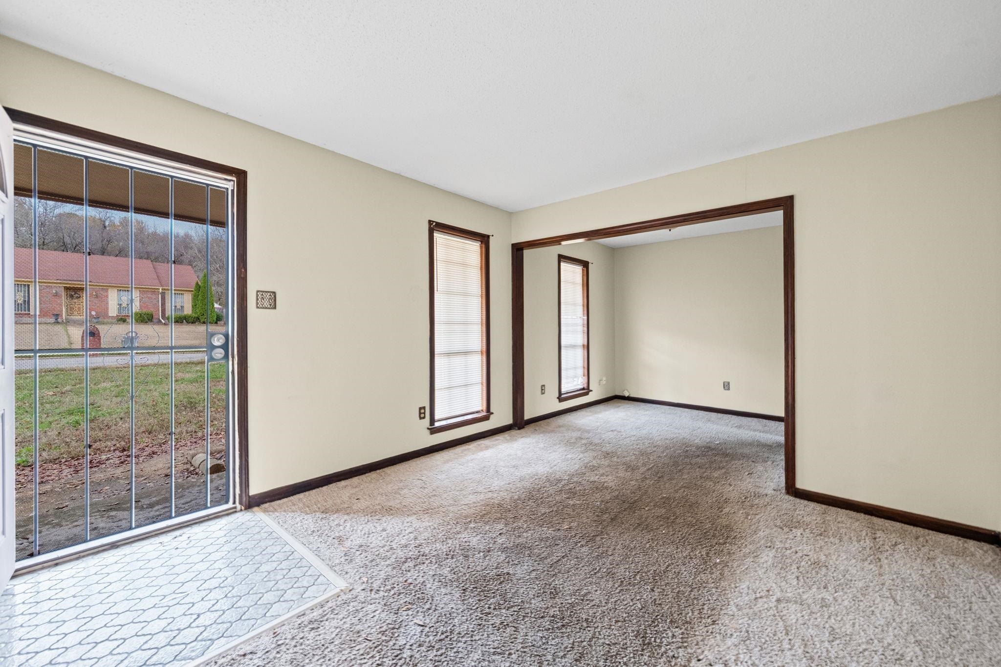 2967 Meadowfair Road Memphis, TN 38118 - Photo 6 of 19 a view of empty room with floor to ceiling window