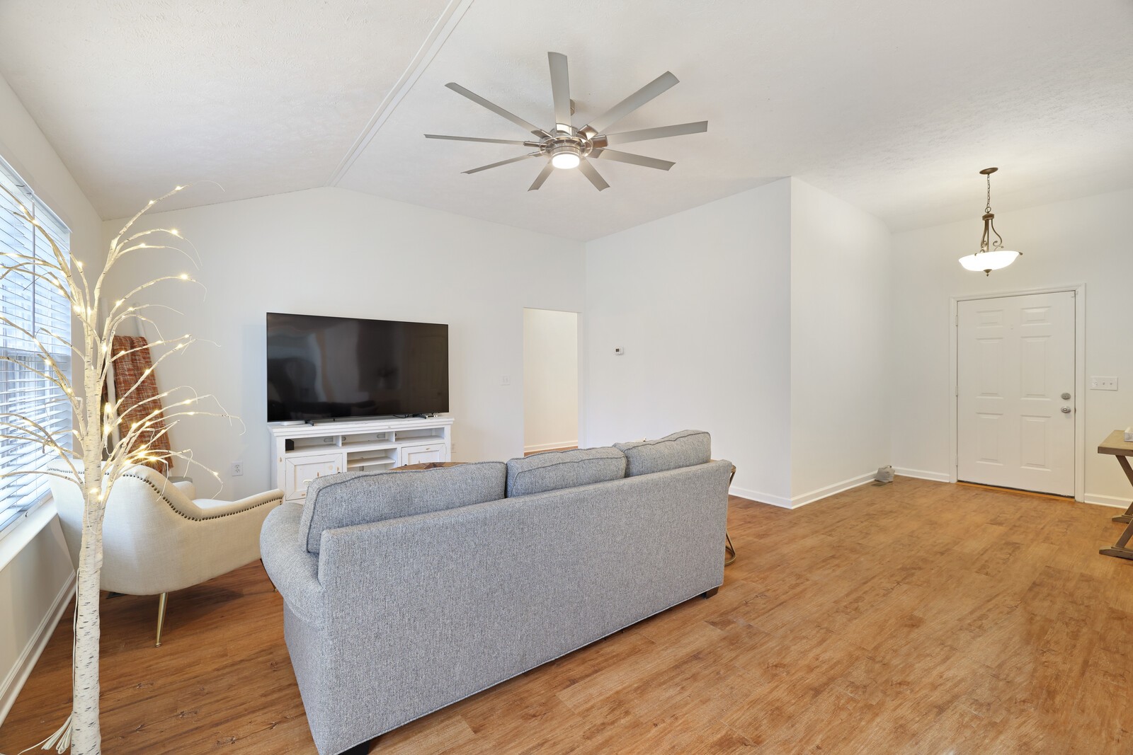 808 Jonathan Drive Lebanon, TN 37087 - Photo 3 of 29 a living room with furniture and a flat screen tv