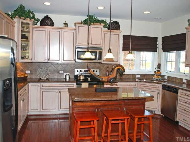 10529 Swerling Way Raleigh, NC 27614 - Photo 9 of 12 Island Kitchen - Features Durable Silestone Counters & 42" Cabinets! Kitchen