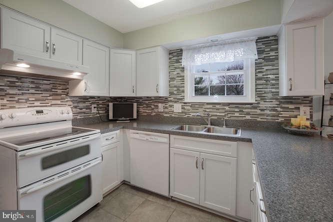 2177 Ambleside Court Frederick, MD 21702 - Photo 15 of 55 Sunny kitchen window looks out on Koi pond