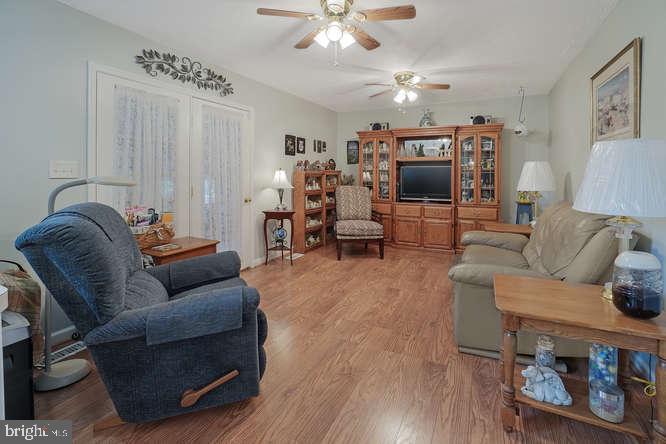 2177 Ambleside Court Frederick, MD 21702 - Photo 21 of 55 Den off kitchen opens to sunroom on left