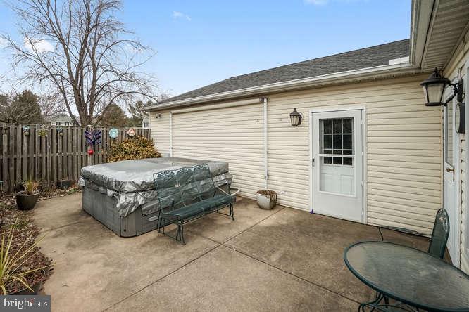 2177 Ambleside Court Frederick, MD 21702 - Photo 28 of 55 Patio off sunroom with 8 person Hottub (as is)