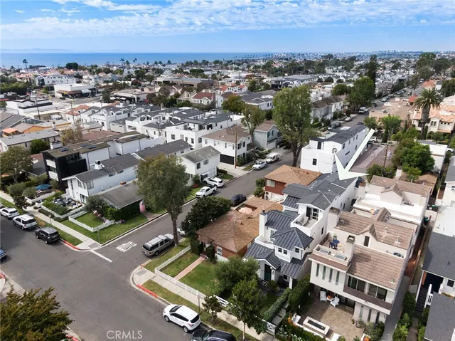 an aerial view of a city with lots of residential buildings