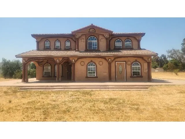 a view of a house with a outdoor space