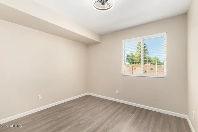 a view of a storage & utility room with wooden floor