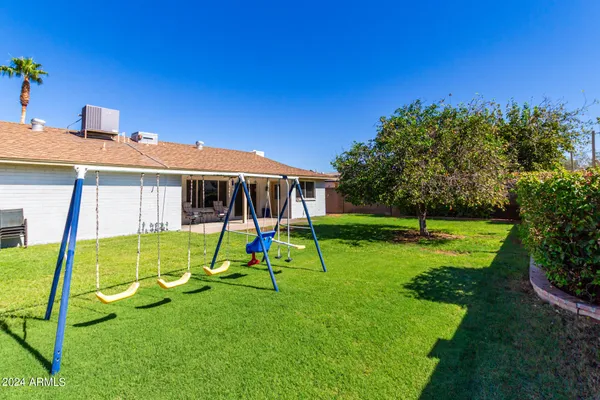 a house view with a garden space