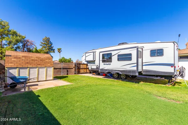 a view of a swimming pool with an outdoor seating