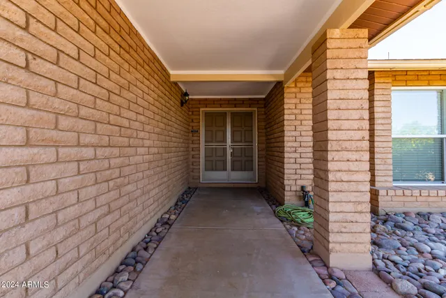 a view of a pathway besides a house