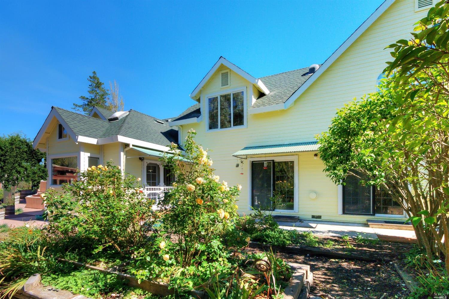 11540 Sutton Road Petaluma, CA 94952 - Photo 1 of 1 front view of a house with a yard