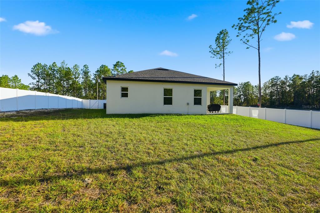 8549 Southwest 129 Lane Ocala, FL 34473 - Photo 30 of 31 a bathroom with a sink and mirror
