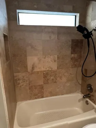 a bathroom with a bathtub