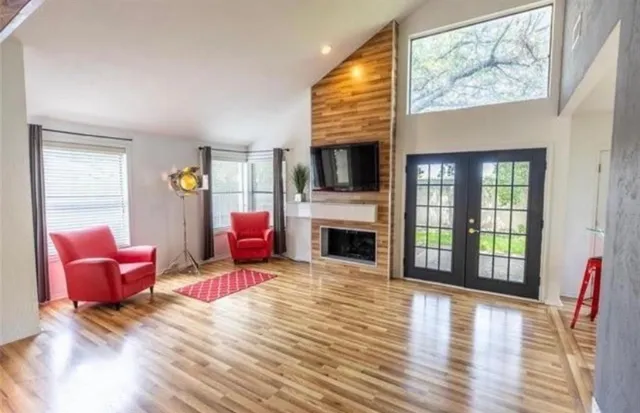 a living room with furniture or fireplace and a flat screen tv