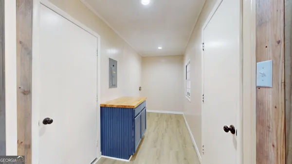 a bathroom with a granite countertop sink and mirror