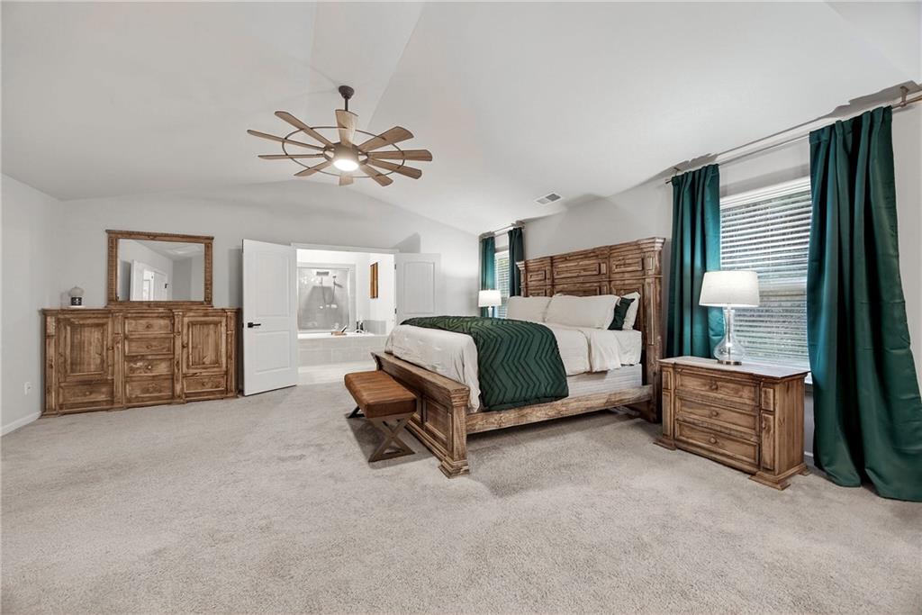 4863 Sultana Way Atlanta, GA 30331 - Photo 23 of 42 a bedroom with a bed dresser and window