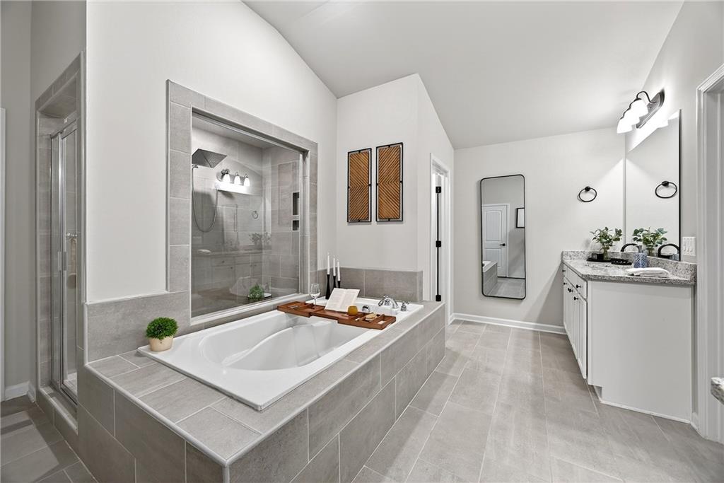 4863 Sultana Way Atlanta, GA 30331 - Photo 27 of 42 a bathroom with a sink a tub and a mirror