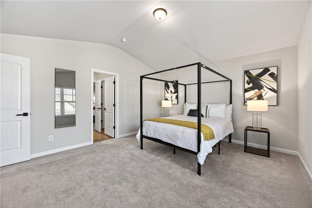 4863 Sultana Way Atlanta, GA 30331 - Photo 29 of 42 a bedroom with a bed lamp closet and window