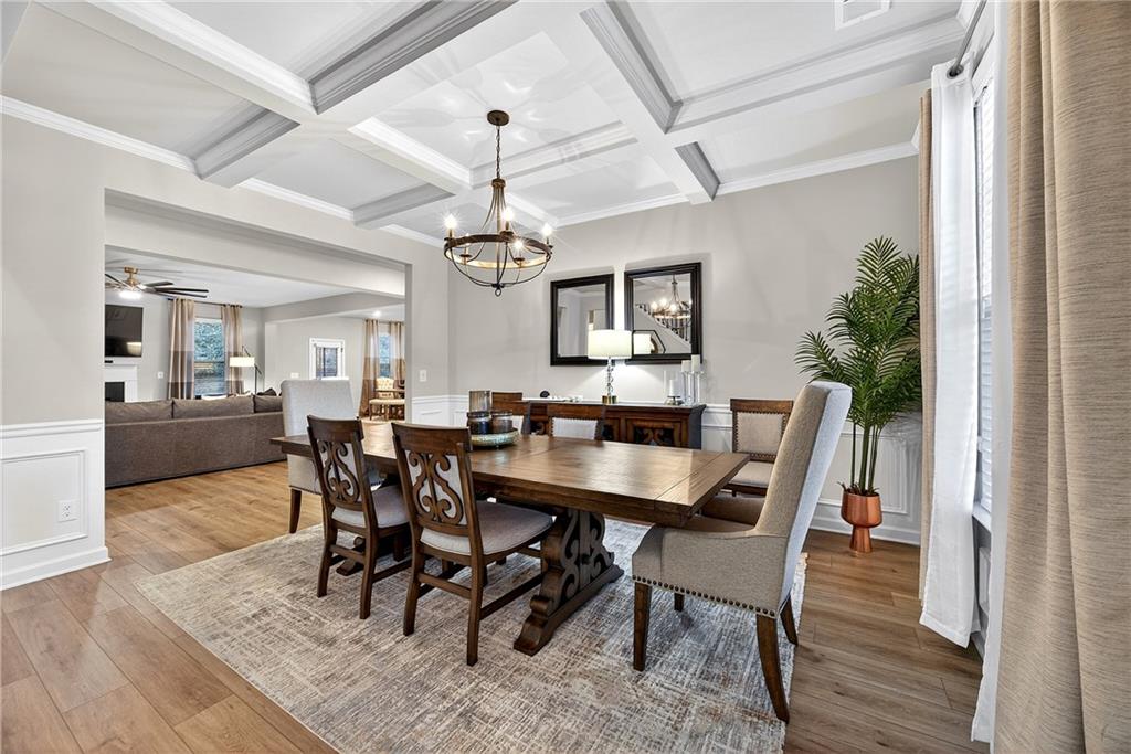 4863 Sultana Way Atlanta, GA 30331 - Photo 4 of 42 a view of a dining room with furniture and wooden floor