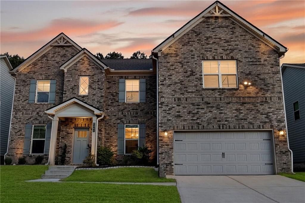 4863 Sultana Way Atlanta, GA 30331 - Photo 41 of 42 front view of a house with a yard