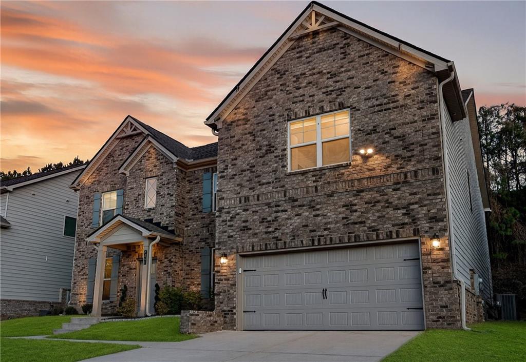 4863 Sultana Way Atlanta, GA 30331 - Photo 42 of 42 a front view of a house with a yard