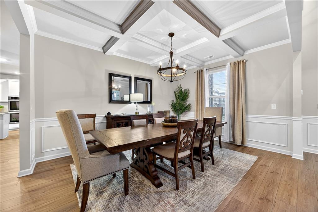 4863 Sultana Way Atlanta, GA 30331 - Photo 5 of 42 a view of a dining room with furniture window and wooden floor