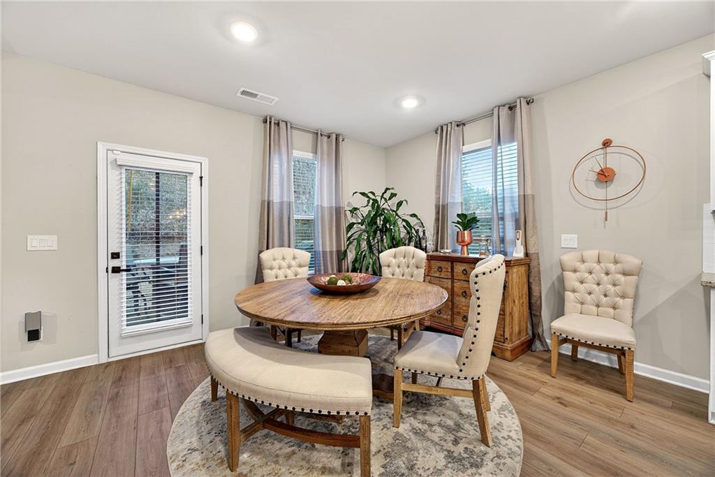 4863 Sultana Way Atlanta, GA 30331 - Photo 10 of 42 a view of a dining room with furniture and wooden floor