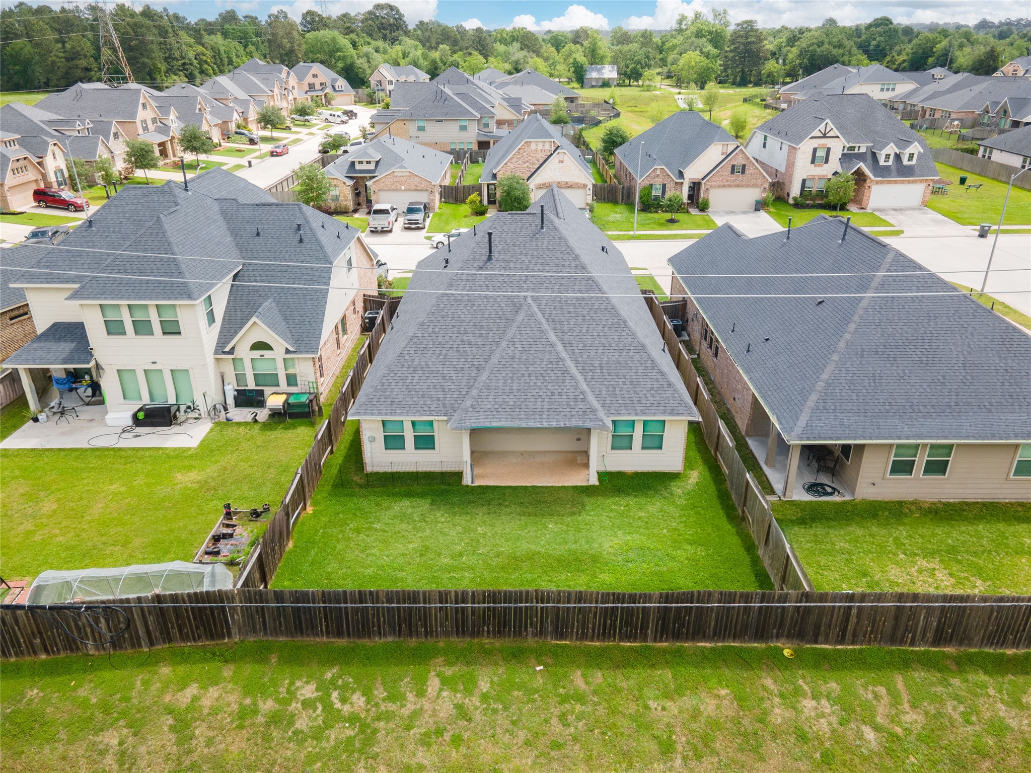 1314 Orchard Ridge Lane Tomball, TX 77375 - Photo 33 of 35 From above, the property offers a clear perspective of the lot size and surrounding homes.
